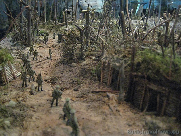 Mockup with small figures of soldiers improves the exhibition