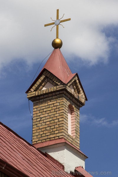 In 1891, a bell tower was built beside the small church.