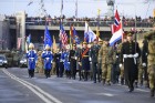Militārajā parādē piedalījās aptuveni 1700 karavīri, zemessargi, policisti, robežsargi, ugunsdzēsēji un jaunsargi. Par godu Latvijas valsts neatkarība 10